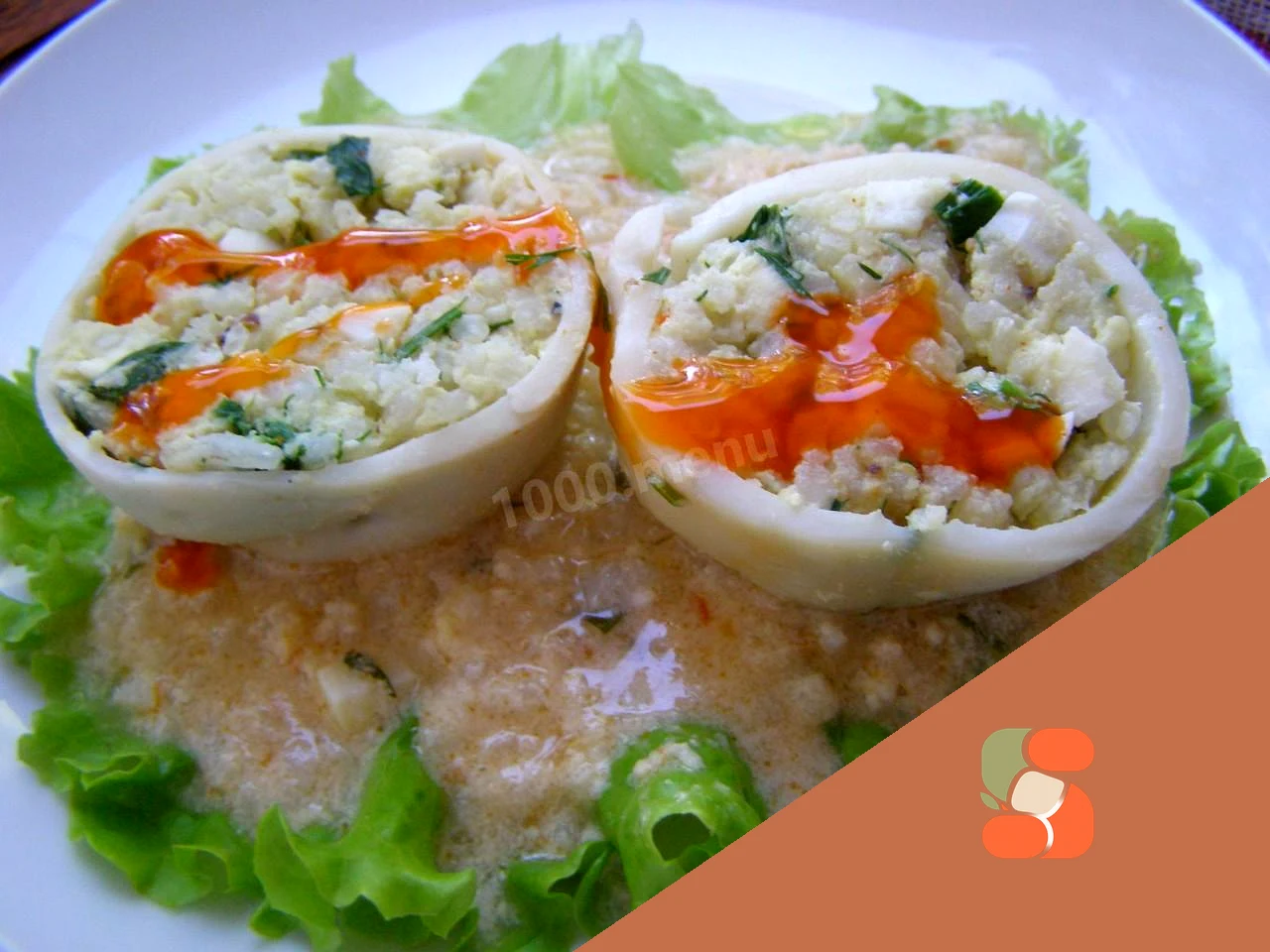 Фаршировані кальмари з рисом та яйцем