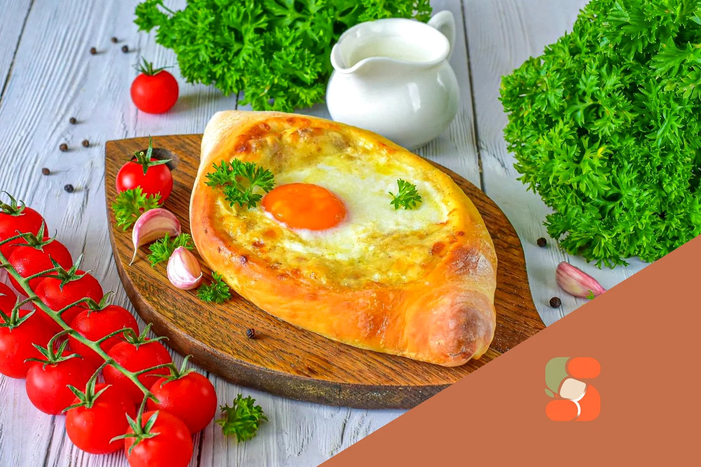 Хачапурі аджарськи чкмерулі