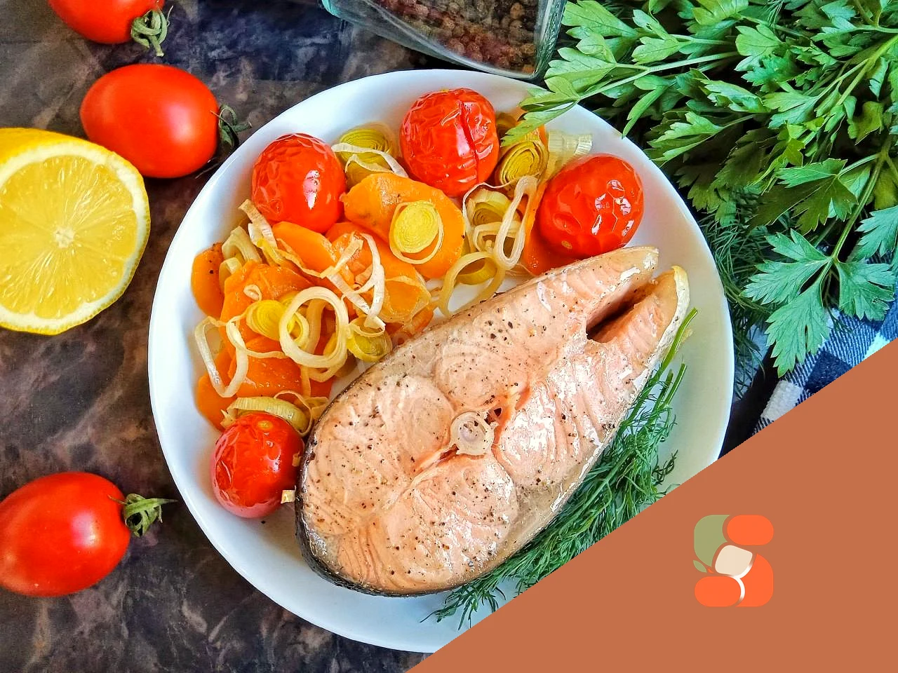 Червона риба з овочами в духовці