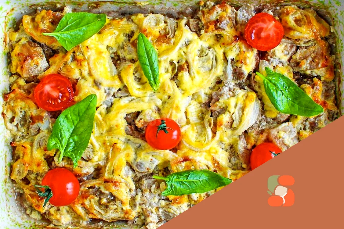 М'ясо свинини з сиром та майонезом під шубою