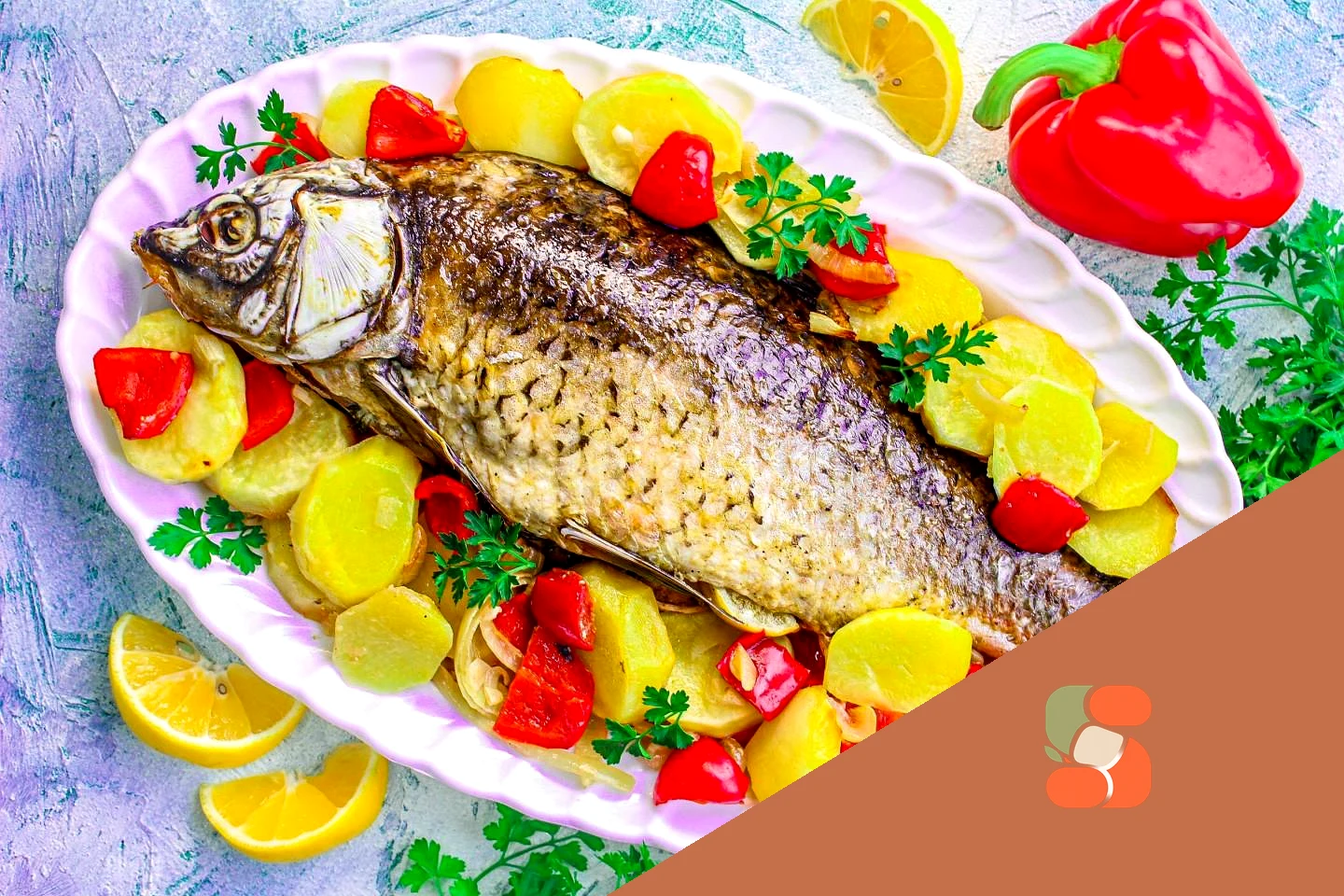 Сазан у духовці цілком у фользі