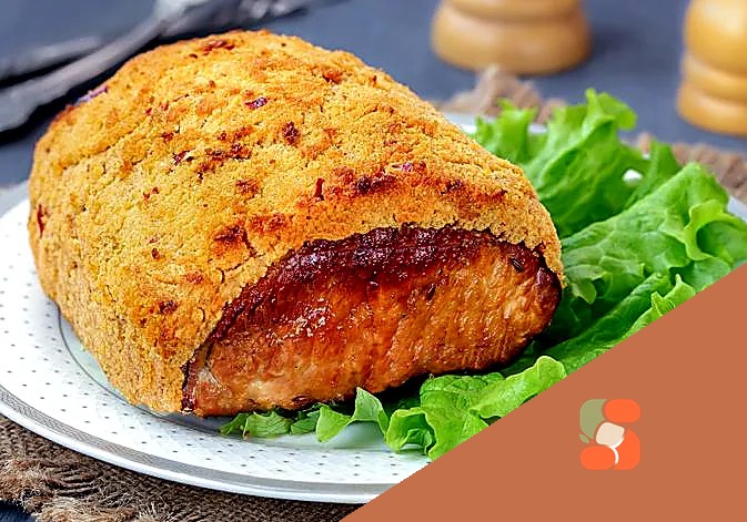 Буженина, запечена в хлібній крихті з абрикосовим джемом та перцем чилі