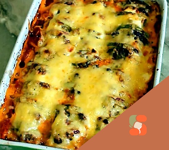 Кабачки, запечені в духовці, з фаршем та рисом