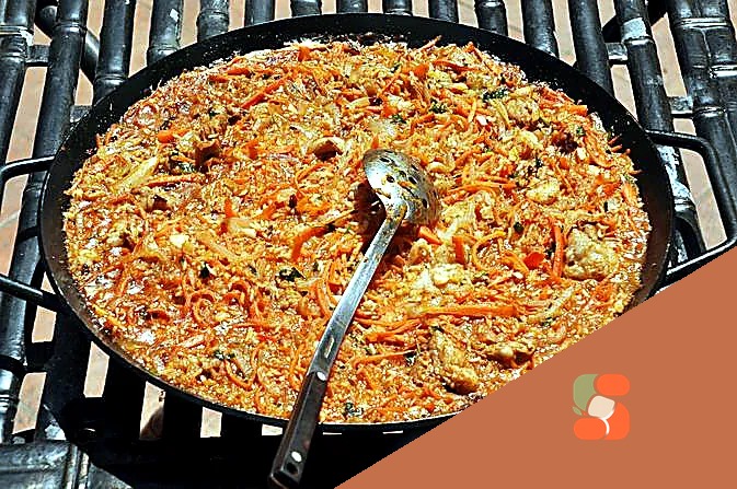 Плов зі свининою у казані на вугіллі