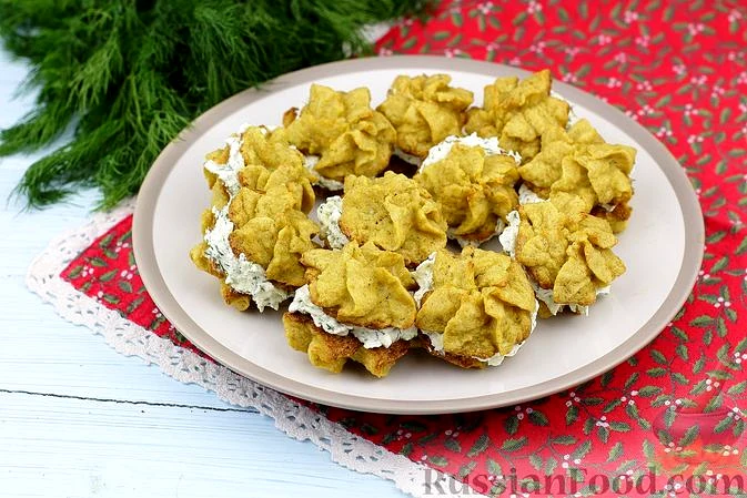 Закусочні тістечка з цвітної капусти з гострою сирною начинкою