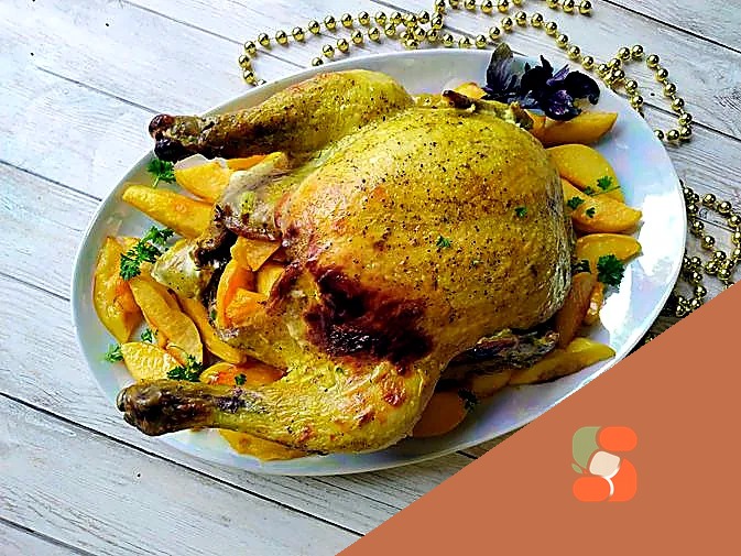Запечена курка в духовці фарширована айвою